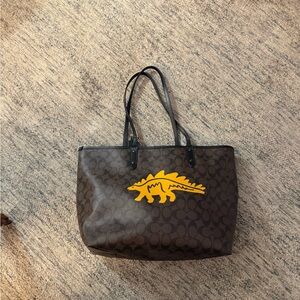 Coach Reversible Tote Bag with Yellow Dinosaur Design